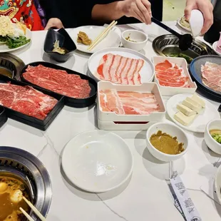 Ribeye, wagyu, lamb, pork, veggies and sauces