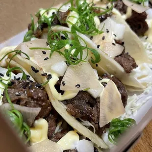 Three Bulgogi Tacos - there is Mayonnaise on it. I'd ask to make it without it if you don't like mayonnaise.