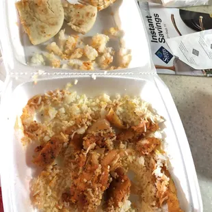 two takeout containers of food