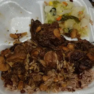 This is the oxtails, rice and peas with cabbage I was served. This was 18.00 and I had not eaten anything,smh. Please do better!