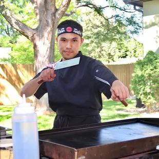 Our Chef Henry (we love you Henry!) arrived 15 minutes prior to our start time &amp; got set up in the backyard.