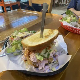 Turks N' Durks Sandwich- Oven-roasted and sliced turkey, baby Swiss, caramelized onion, avocado, tomato, and Durkee.