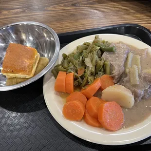 a plate of food on a tray