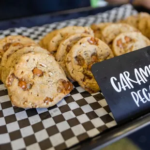a tray of caramel pecan cookies