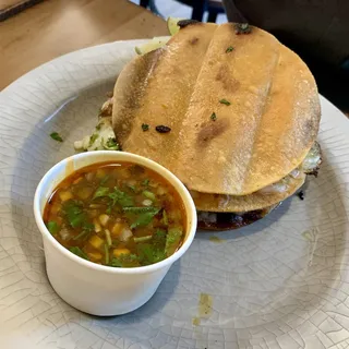 Tostada Montada Beef Birria & Consomme