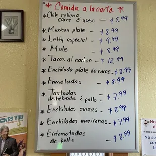 a white board with spanish writing