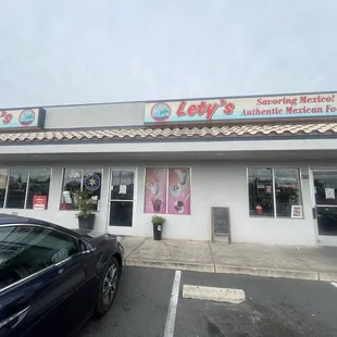 Outside entrance with daily specials sign.