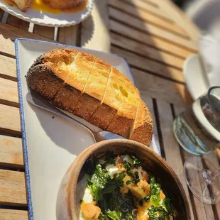sheep's milk ricotta with hot honey and garlic with garlic bread