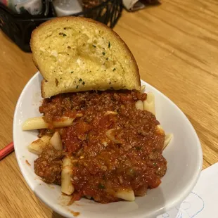 a plate of pasta and bread