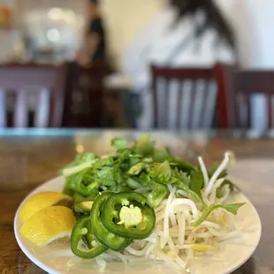 a plate of noodles and vegetables