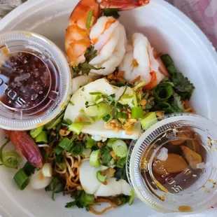 Dry seafood noodles to go $15.50.