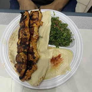 Chicken kabobs with hummus and tabouleh