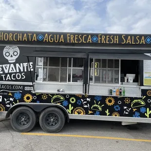 a food truck parked in a parking lot