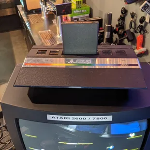 The arcade has an Atari 2600 and 7800 console.