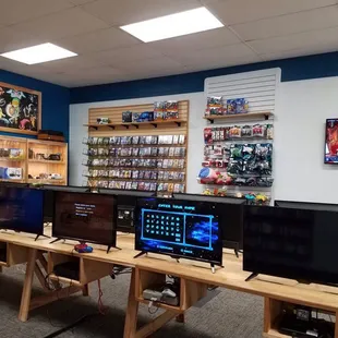 Game consoles with screens up to 8 different games can be played at once!Games and accessories,new &amp; used!Trade in for cash or store credit.