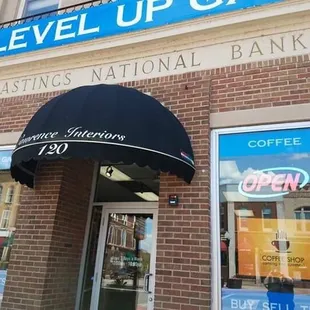 An old awning and a temporary banner but they are open!