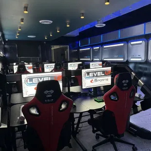 a row of gaming monitors