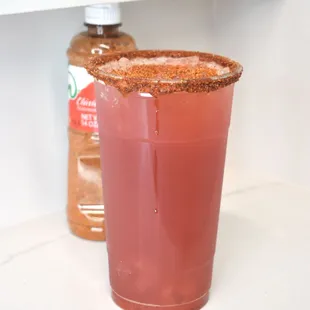 Pica Sandía energizing drink watermelon &amp; raspberry flavors. Tajín and chamoy optional.