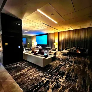 Another lounge area with huge TV