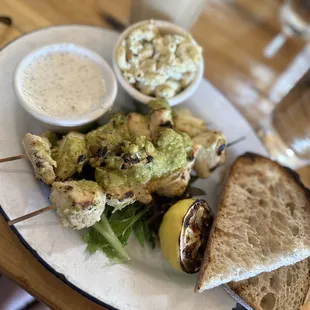 Chicken kabobs with tzatziki, mac salad and sour dough