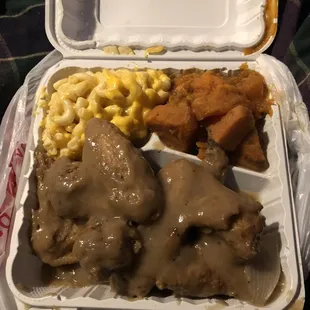 One on the southern style dinners: Smothered chicken wings, yams, Mac and cheese!