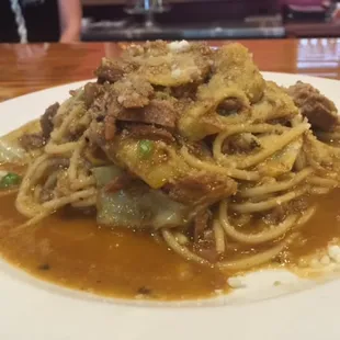 Slow cooked duck spaghetti with artichokes
