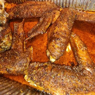 a plate of fried fish