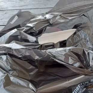 a sandwich in a plastic bag