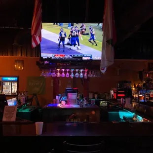 a bar with a television