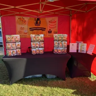 a table with a red tent