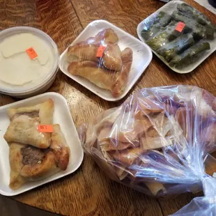 Hummus, grape leaves, meat and spinach pies, and pita chips.