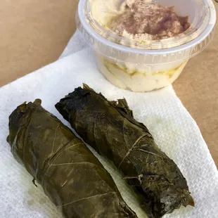 Came for the pizza, and got some free swag...excellent grape leaves!  Super friendly owners.  Great pizza, too.