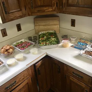 Fattoush chicken salad tray + taco bar "build your own" with beef and chicken. We are so very pleased with everything including service.