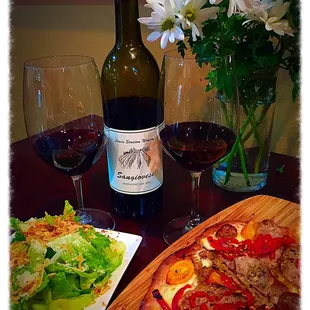 My favorite bottle of wine paired beautifully with a meat pizza and citrus salad. Their Chef Jason Dunn does a fantastic job!