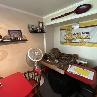 a fan in the corner of a room