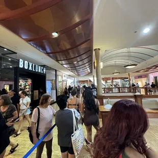 Standing in line for her Grand Opening of her 3rd store