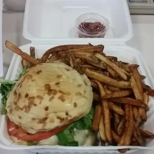 Mushroom Swiss burger with fries