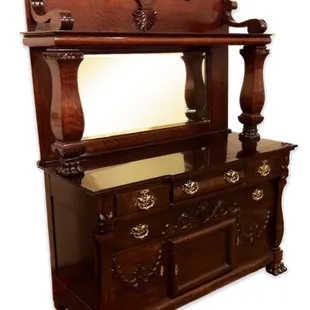 antique side board. repaired veneer, and replaced several missing parts.  restored back to beautiful in no time at all!