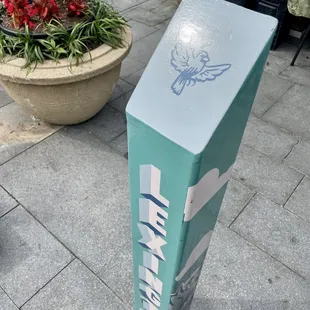  blue box with a bee on it