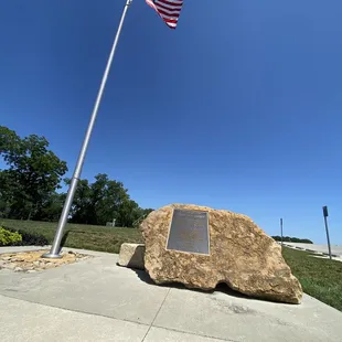 Flagpole and rock plaque