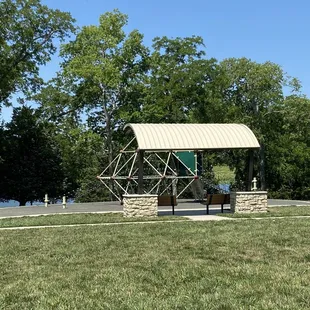Playground with seating under some shading.