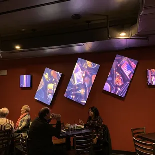a group of people sitting around a table