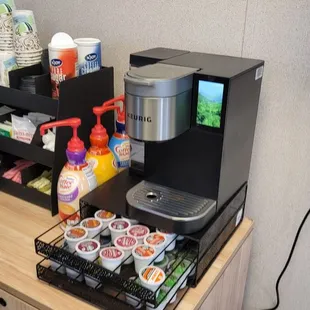 Complimentary coffee sodas and snacks while you wait.