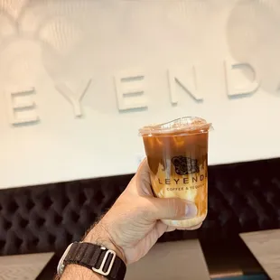 Iced vanilla coffee to go.