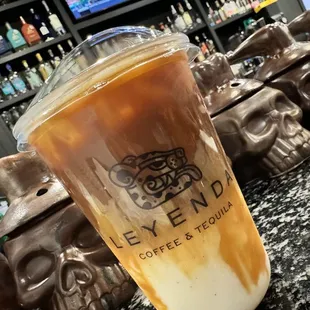 Iced vanilla latte to go.