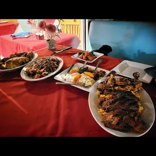 Grilled lamb, chicken and rice with marinated vegetables and appetizer plate. YUM!