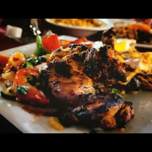 Grilled chicken, lamb and vegetables.