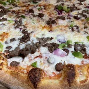 Philly stek  w onions green peppers and black olives.