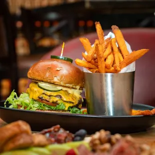 a burger and fries on a plate