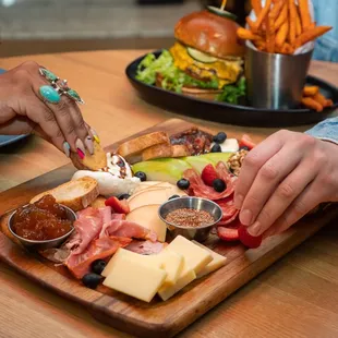 a person serving a platter of food